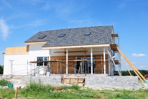 Renovation house with asphalt shingles roofing construction, painting wall, stucco, wall repair, insulation, attic skylight windows.